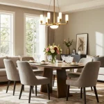 Un candelabru LED elegant suspendat deasupra unei mese de dining, iluminând atmosfera rafinată a unei camere de zi moderne.